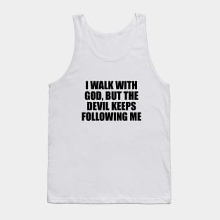 I walk with God, but the devil keeps following me Tank Top